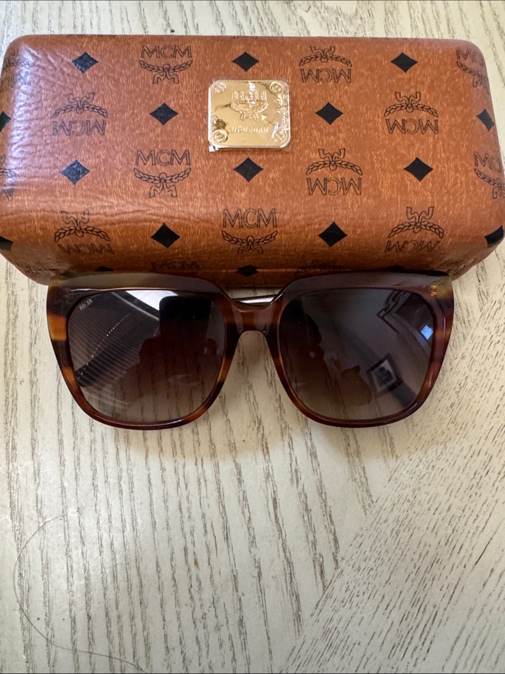 MCM women’s  Tortoiseshell Sunglasses with Brown Gradient Lenses